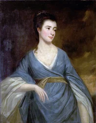 Junge Frau in einem blauen Kleid